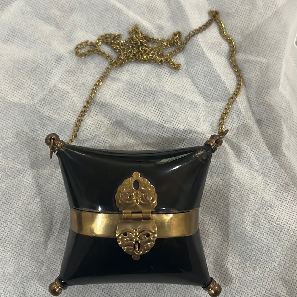 Vintage Hard Pillow-Shaped Black and Brass Purse